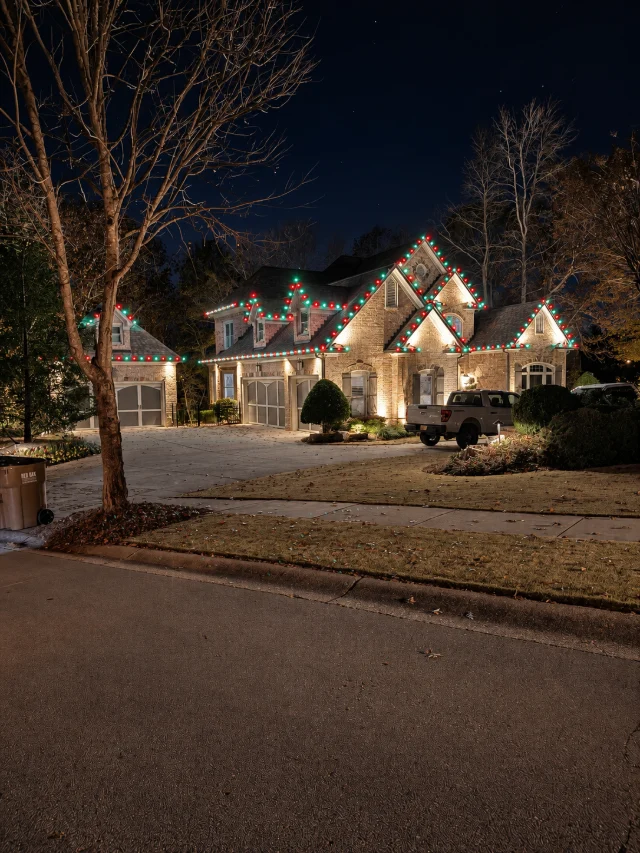 Alternating red and green lights tracing the roofline.