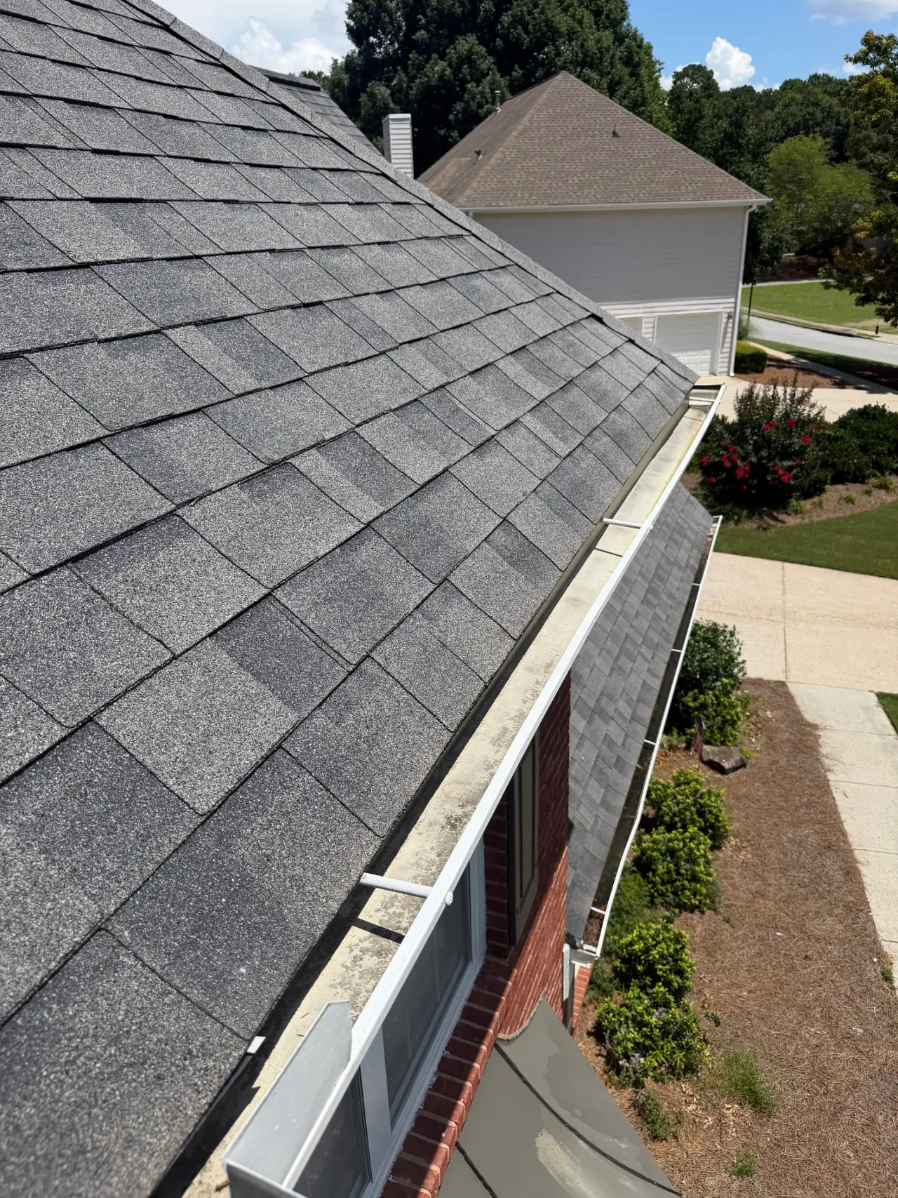 This image is an aerial photo of a gutter that has been cleaned