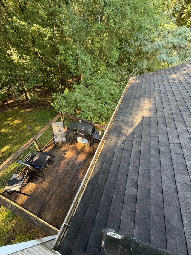 The same gutter above the deck in Winder cleared of heavy debris and plants