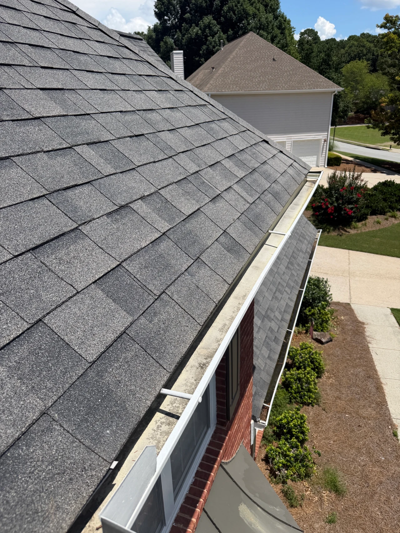 This image is an aerial photo of a gutter that has been cleaned